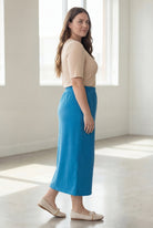 Model wearing Nuggles® 34" Classic Skirt  in Turquoise