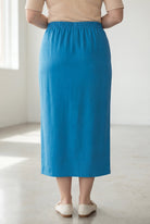 Model wearing Nuggles® 34" Classic Skirt  in Turquoise