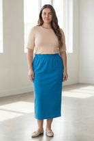 Model wearing Nuggles® 34" Classic Skirt  in Turquoise