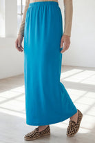 Model wearing Nuggles® 36" Classic Skirt  in Turquoise 