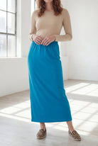 Model wearing Nuggles® 36" Classic Skirt  in Turquoise