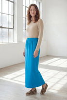 Model wearing Nuggles® 36" Classic Skirt  in Turquoise
