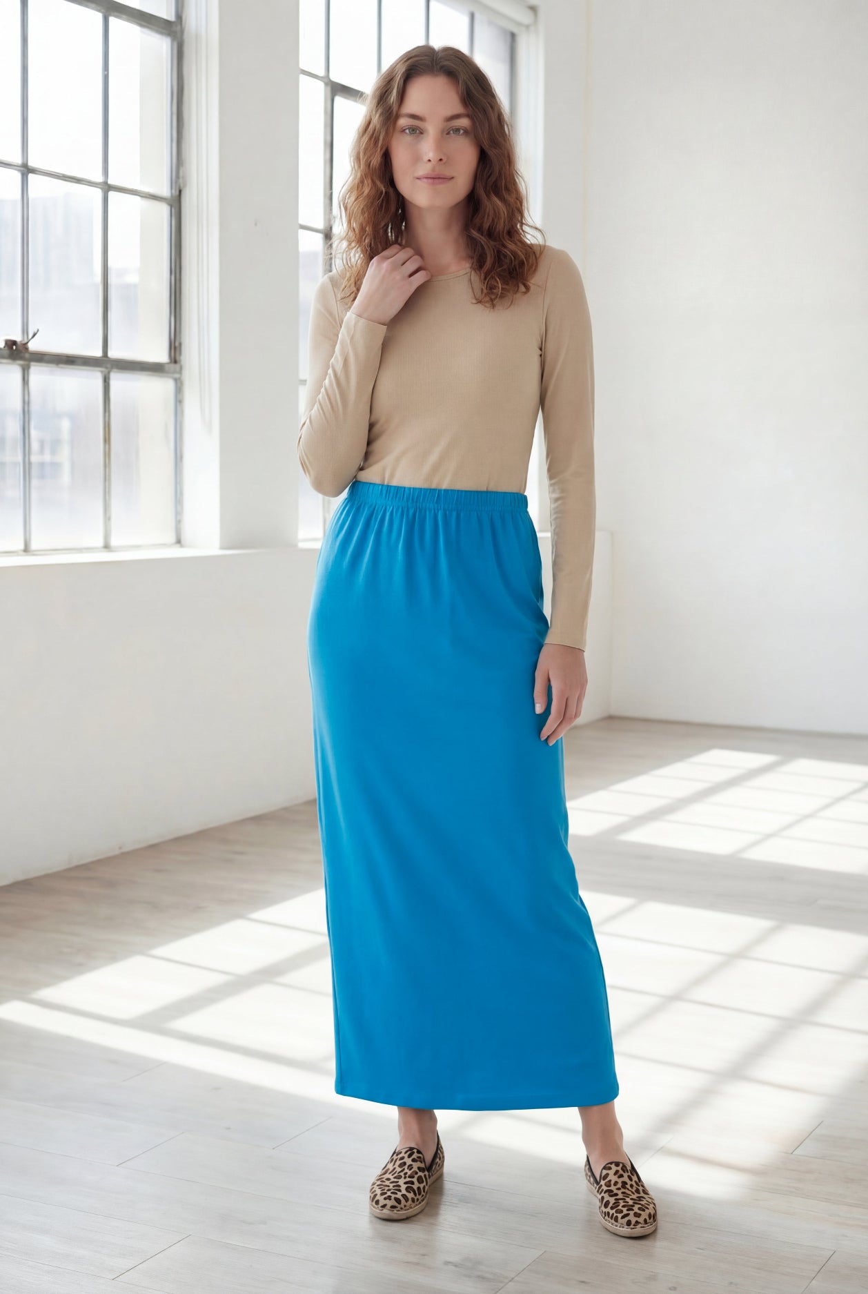 Model wearing Nuggles® 36" Classic Skirt  in Turquoise
