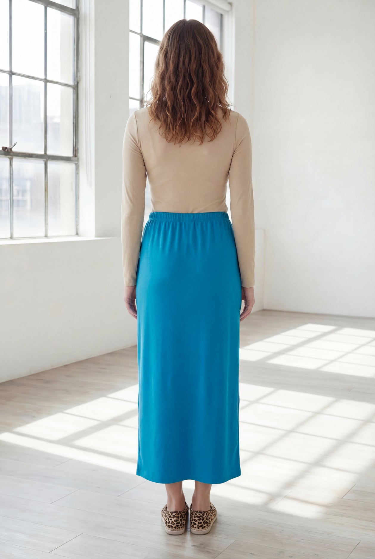 Model wearing Nuggles® 36" Classic Skirt  in Turquoise