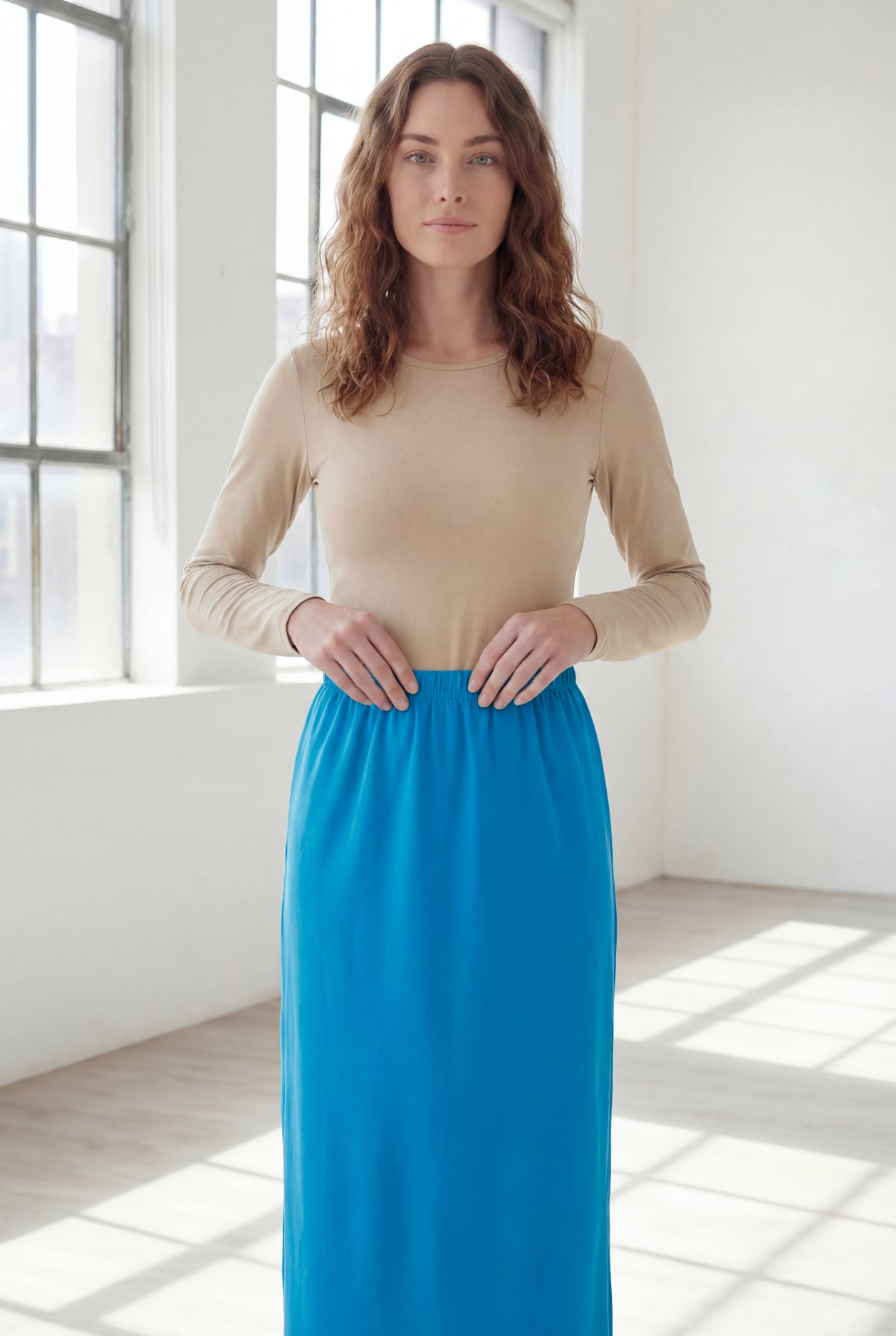 Model wearing Nuggles® 36" Classic Skirt  in Turquoise