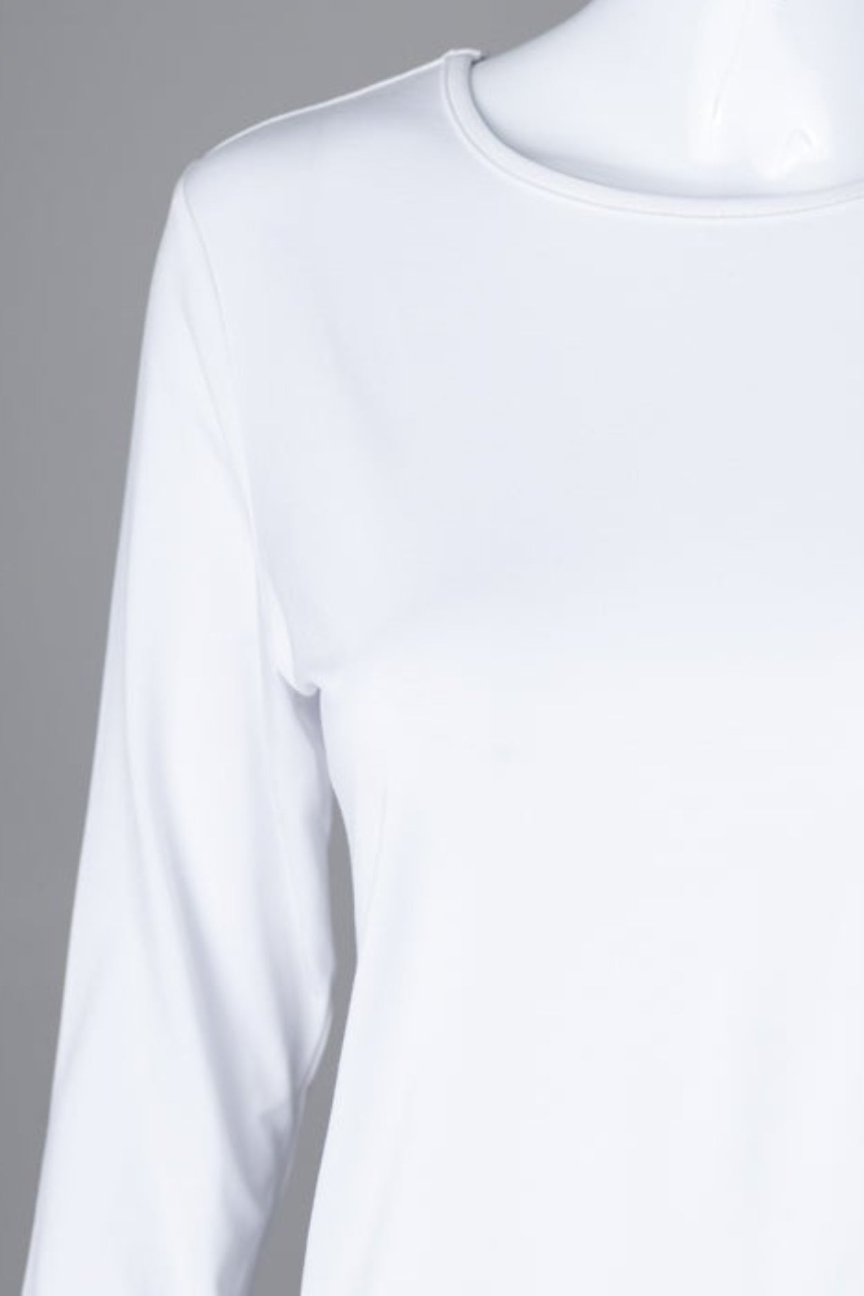 Model wearing Nuggles® 3/4 Essential Tee in White