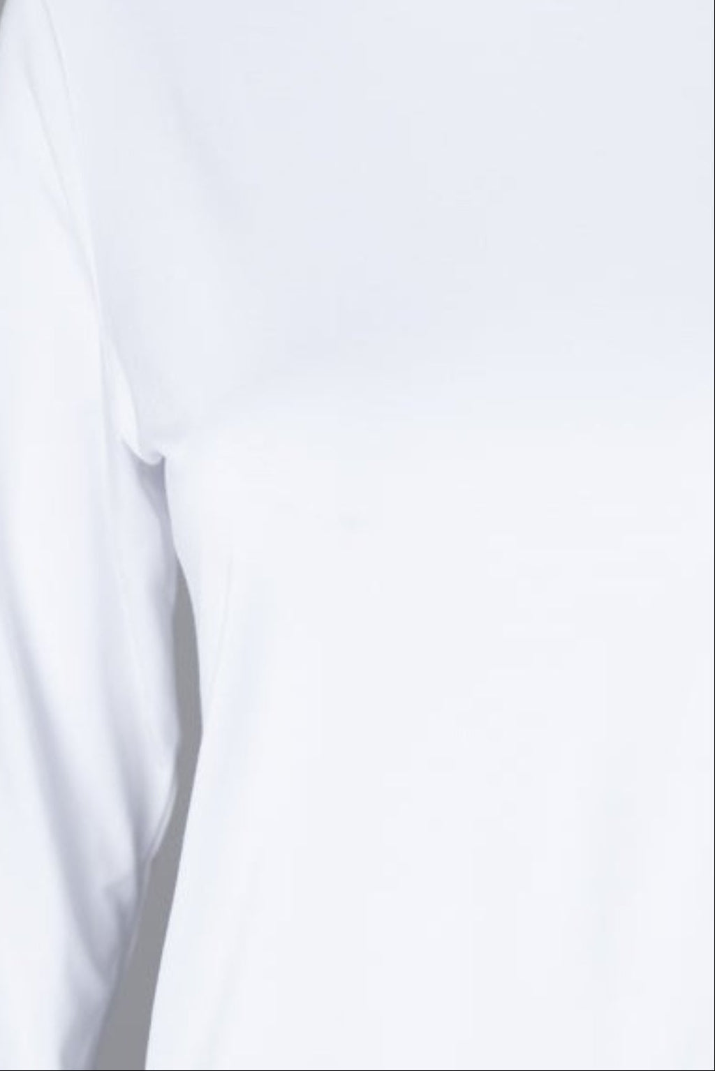 Model wearing Nuggles® 3/4 Essential Tee in White