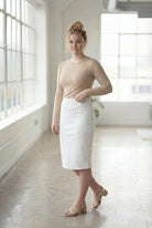 Model wearing Nuggles® 27" Classic Skirt  in White