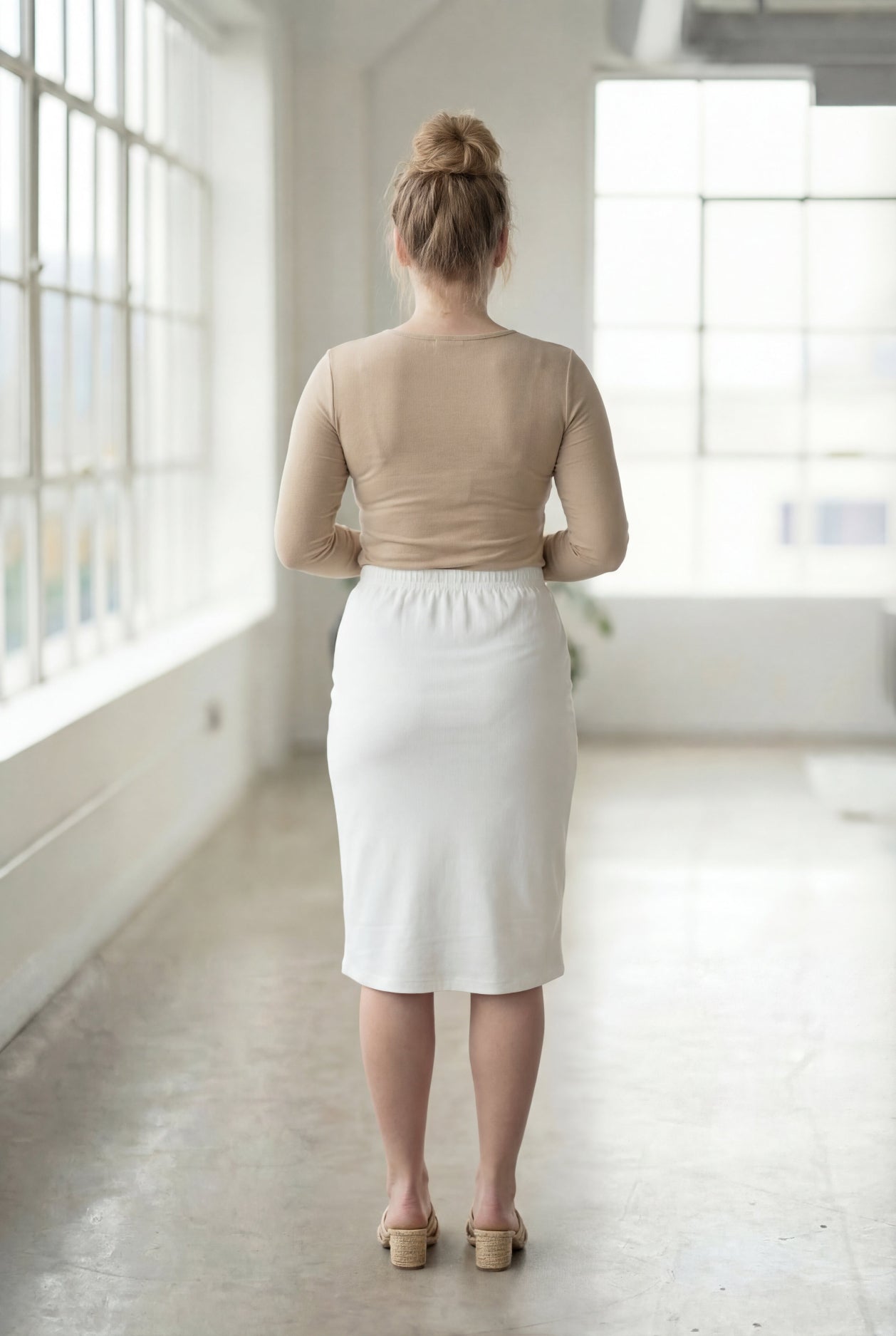 Model wearing Nuggles® 27" Classic Skirt  in White