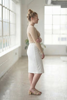 Model wearing Nuggles® 27" Classic Skirt  in White