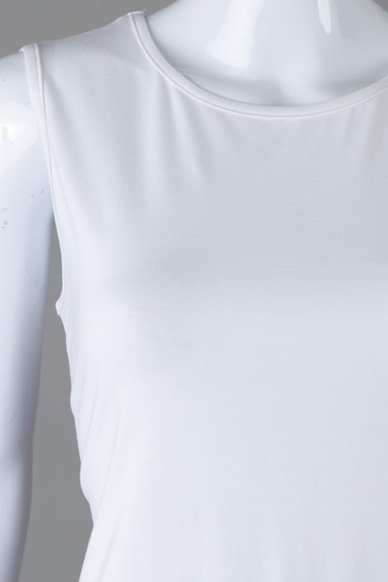 Model wearing Nuggles® Essential Tank in White