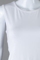 Model wearing Nuggles® Essential Tank in White